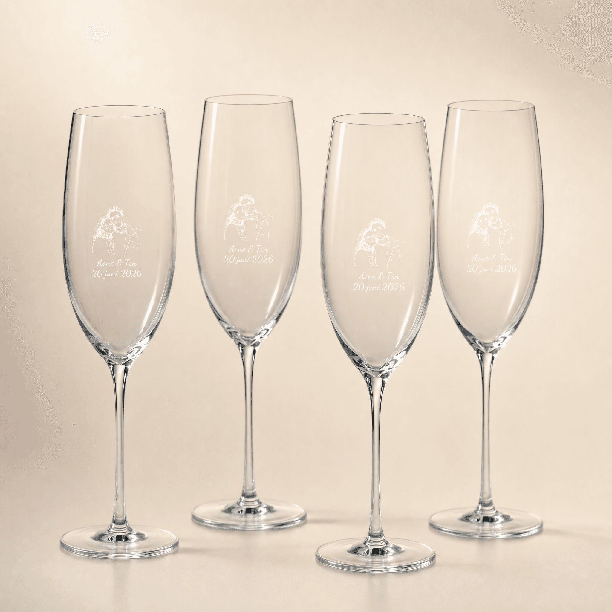 Set of 4 engraved champagne flutes