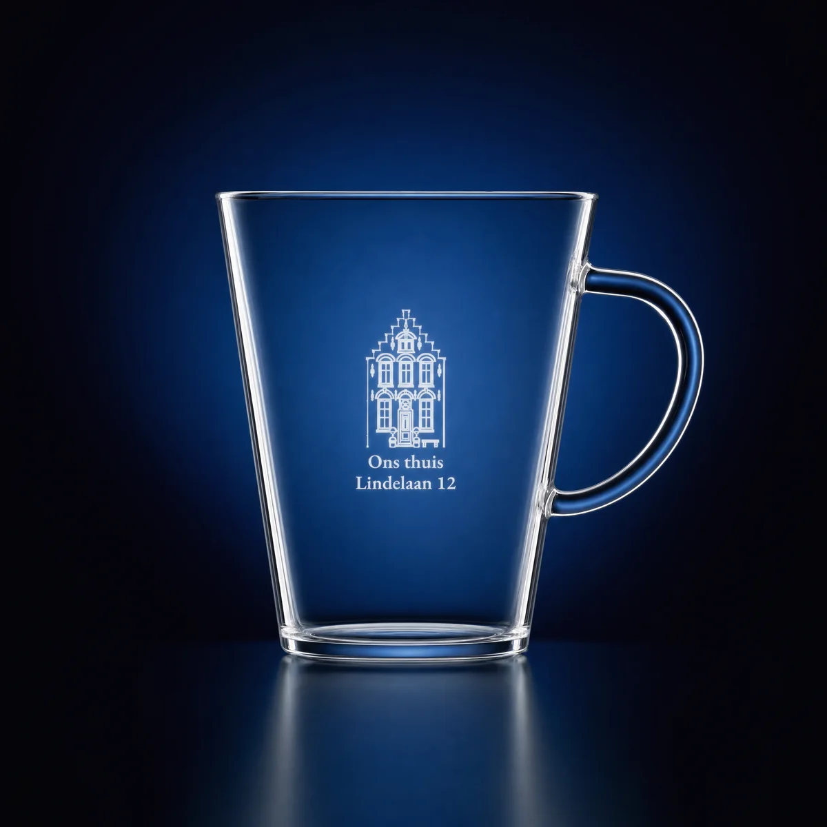 Tea glass with a drawing of a house and the moving-in date
